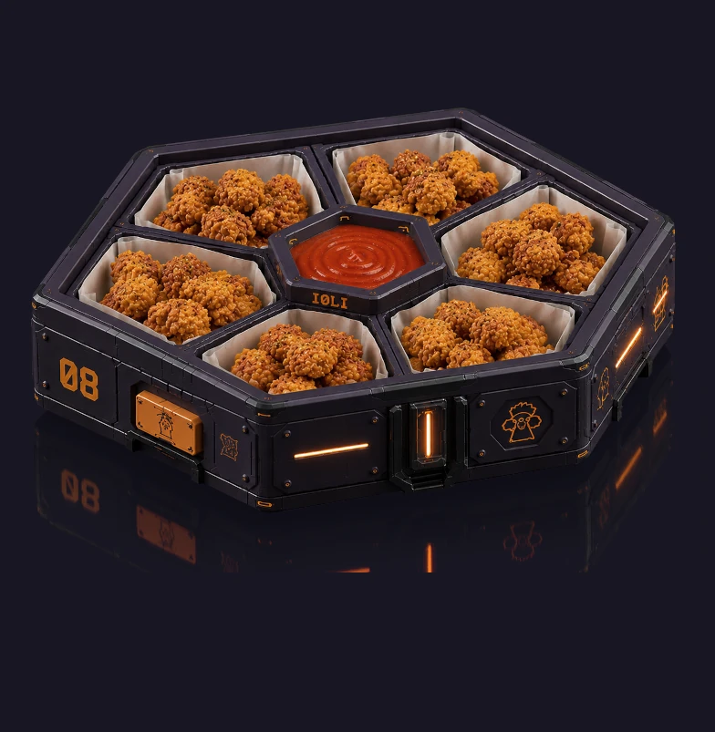 Bouchées de poulet frit avec sauce dans un packaging futuriste